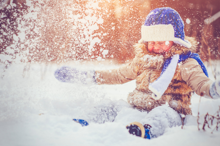 Little boy in winter park